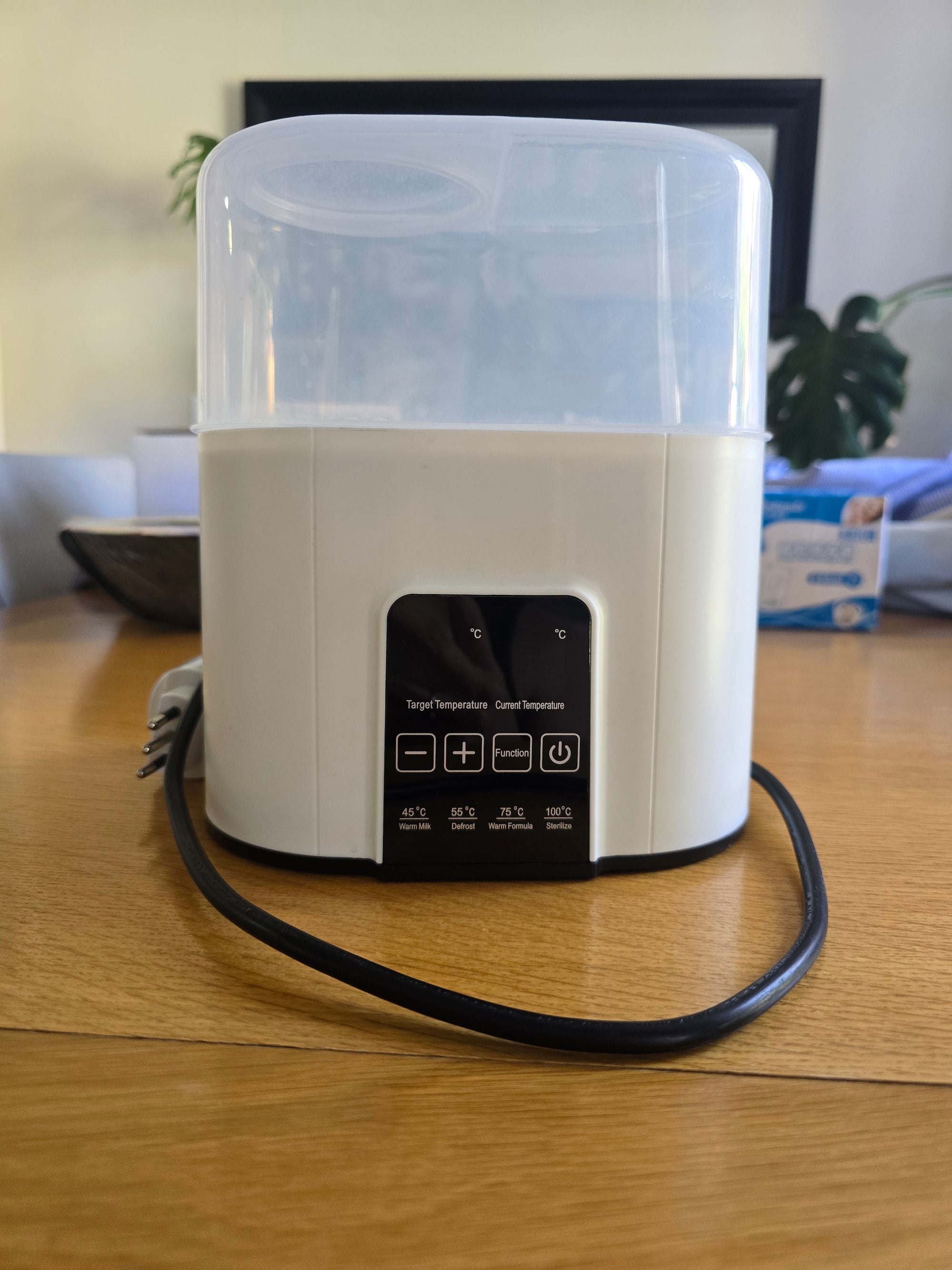 (#PG5436) Calentador y Esterilizador de mamaderas. Marca Genérica