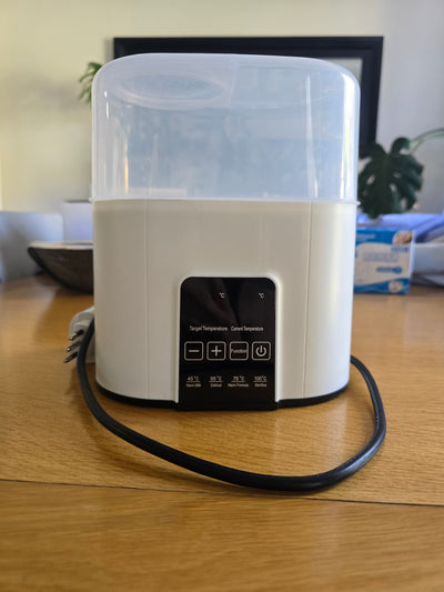 (#PG5436) Calentador y Esterilizador de mamaderas. Marca Genérica