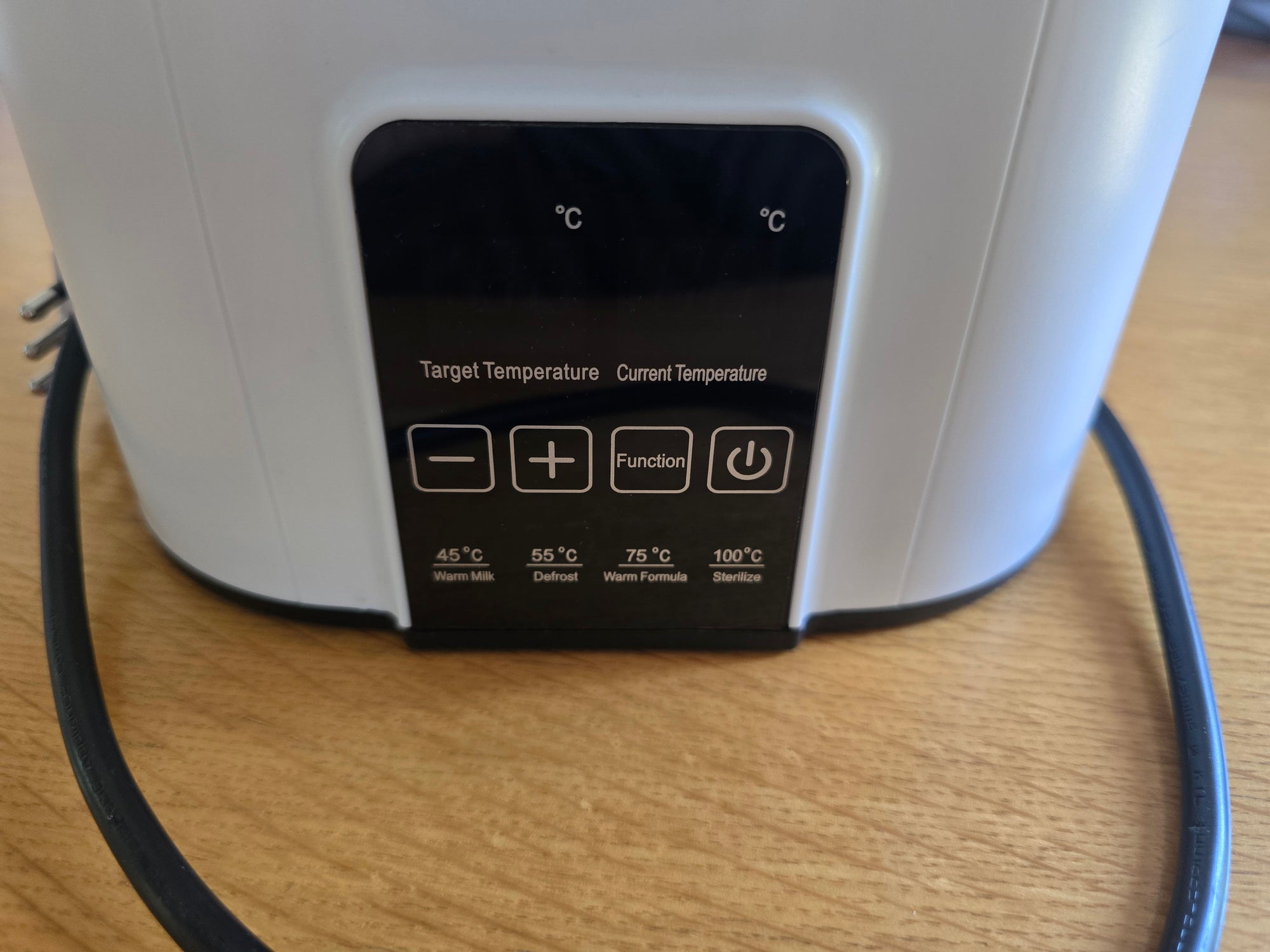 (#PG5436) Calentador y Esterilizador de mamaderas. Marca Genérica