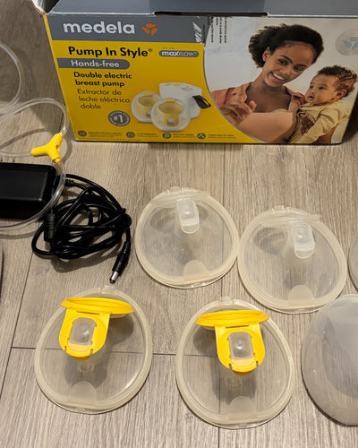 Extractor de leche modelo Pump in Style + Bolsas de almacenamiento de leche. Marca Medela (#PG5973)