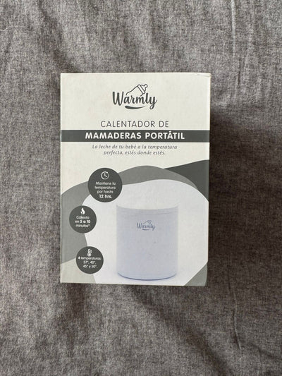 (#PG5397) Calentador de mamaderas portátil. Marca Warmly