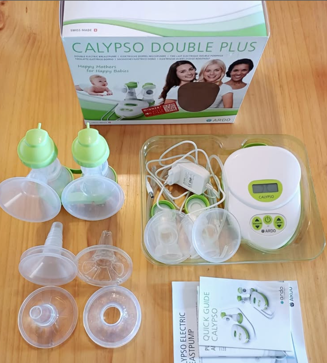 (#PG2638) Extractor doble de leche eléctrico. Marca Calypso