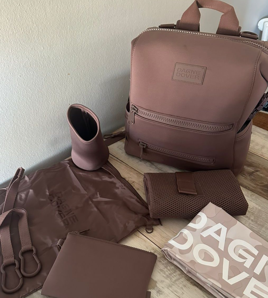 (#PG3963) Mochila pañalera. Marca Dagne Dover