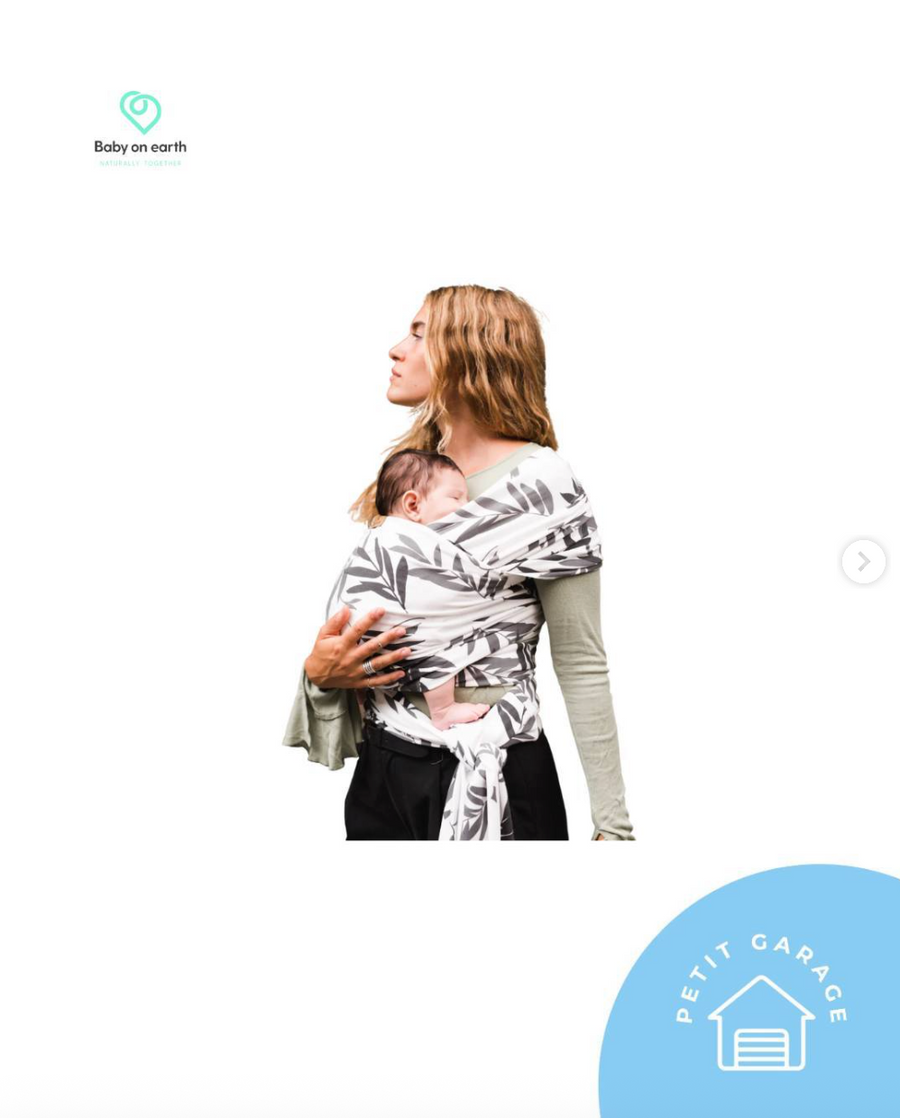 (#PG4782) Fular color blanco con hojas verdes. Marca Baby on Earth