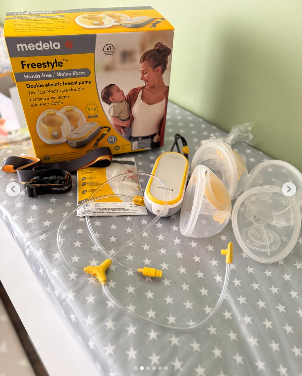 Extractor de leche doble eléctrico modelo Freestlye hands-free. Marca Medela (#PG5800)