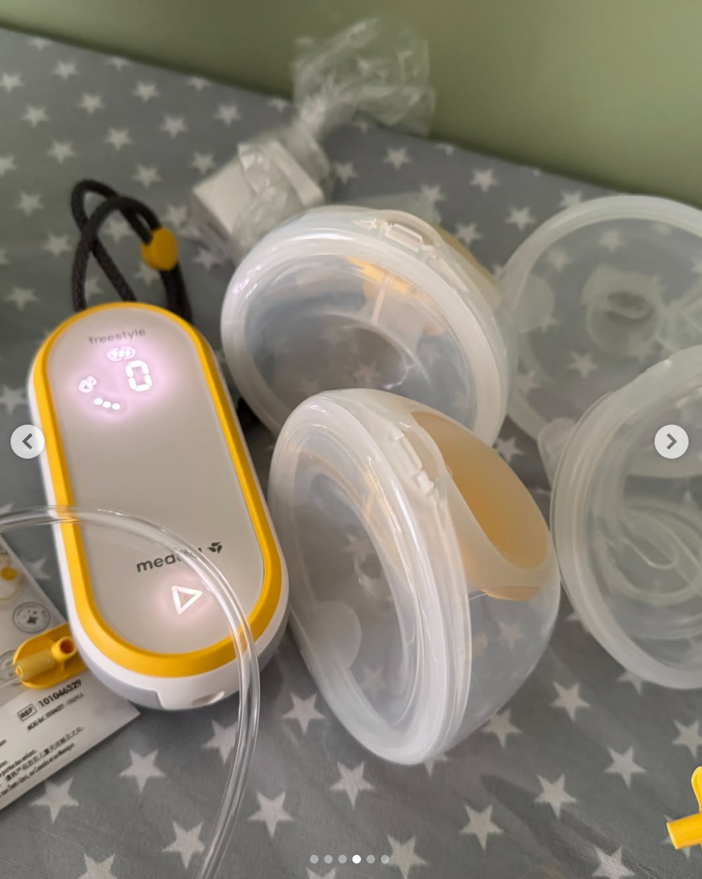 Extractor de leche doble eléctrico modelo Freestlye hands-free. Marca Medela (#PG5800)