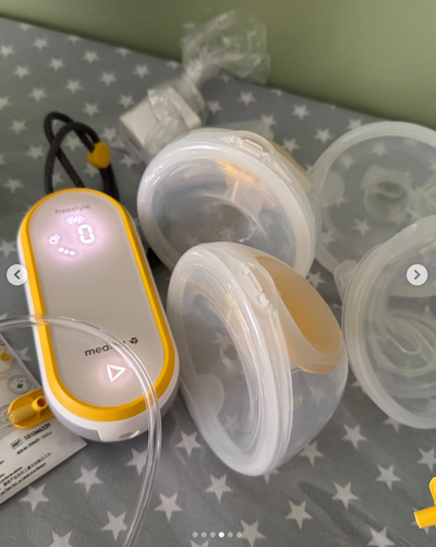 Extractor de leche doble eléctrico modelo Freestlye hands-free. Marca Medela (#PG5800)