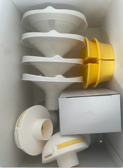 Extractor de leche eléctrico doble modelo Swing Maxi Flex + Cooler + Sostén. Marca Medela (#PG5893)