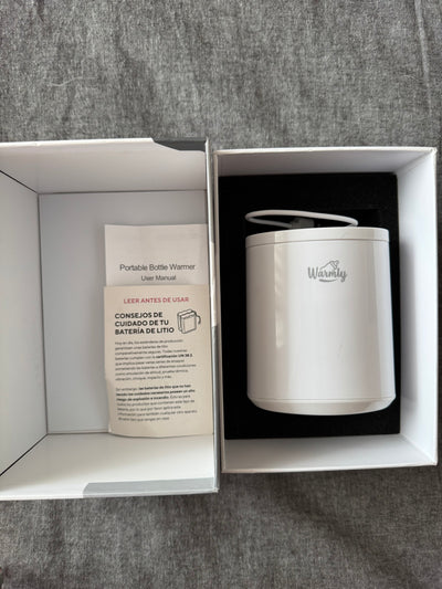 (#PG5397) Calentador de mamaderas portátil. Marca Warmly