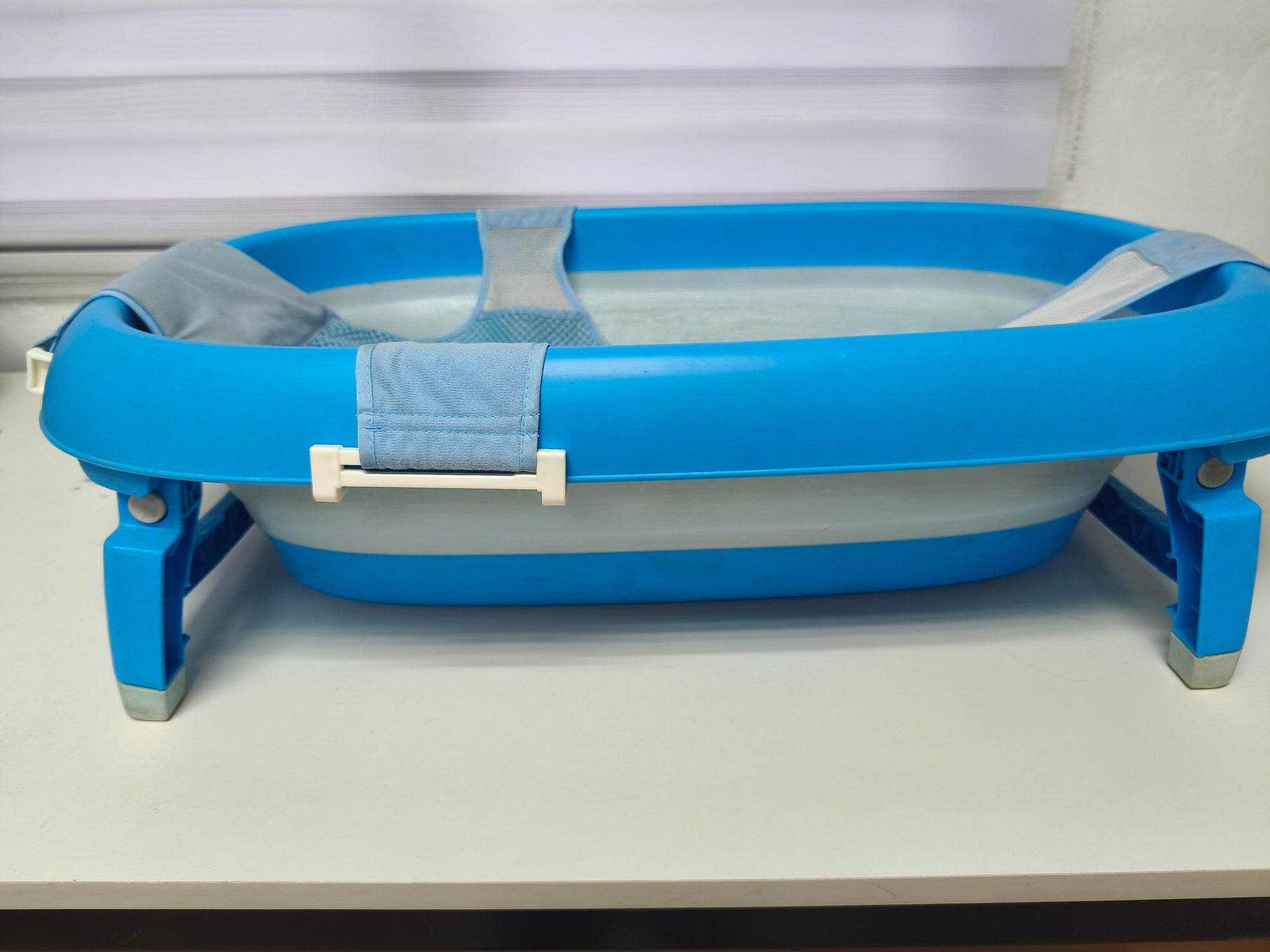 Bañera plegable con hamaca azul. Marca Infanti (#PG5661)