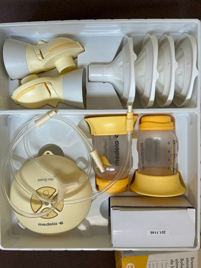Extractor de leche Swing Maxi Flex + caja de 50 bolsas de almacenamiento. Marca Medela (#PG5682)