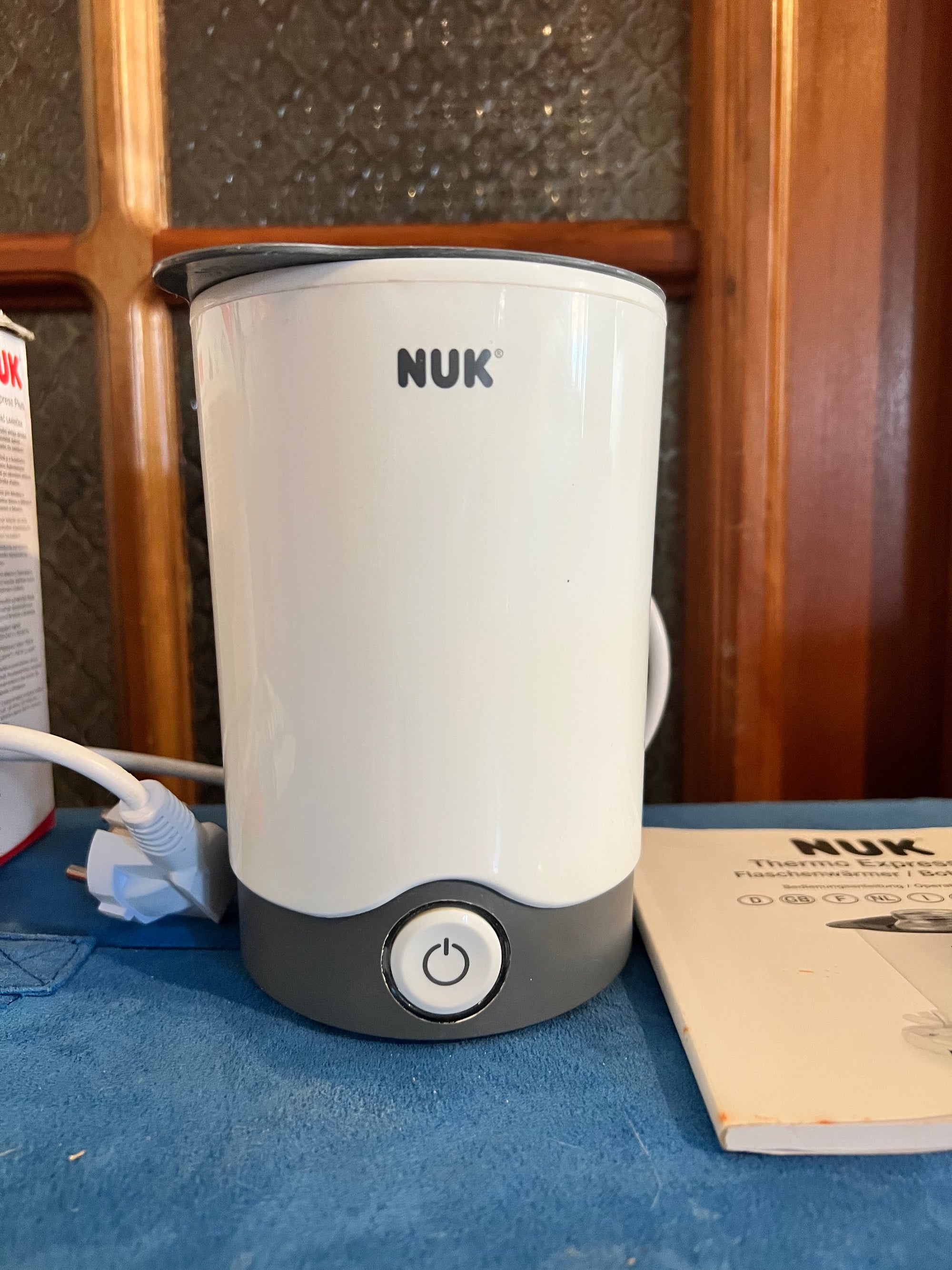 (#PG5050) Calentador de mamaderas modelo Thermo Express Plus (Home and Car). Marca NUK