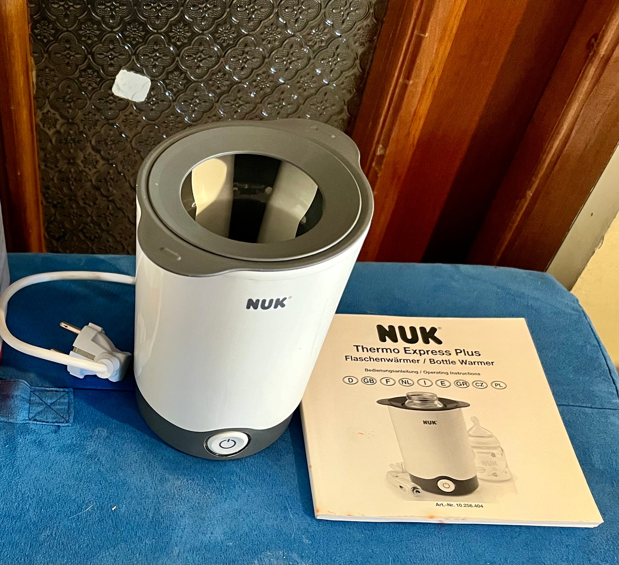 (#PG5050) Calentador de mamaderas modelo Thermo Express Plus (Home and Car). Marca NUK