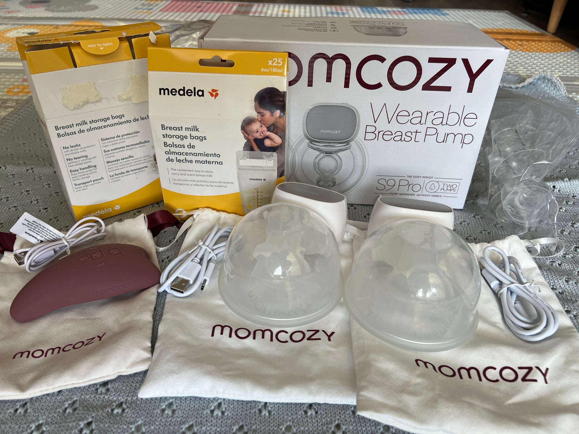 (#PG4543) Extractor de leche doble eléctrico modelo S9 Wearable Breast Pump + Bolsas recolectoras de leche. Marca MomCozy y Medela