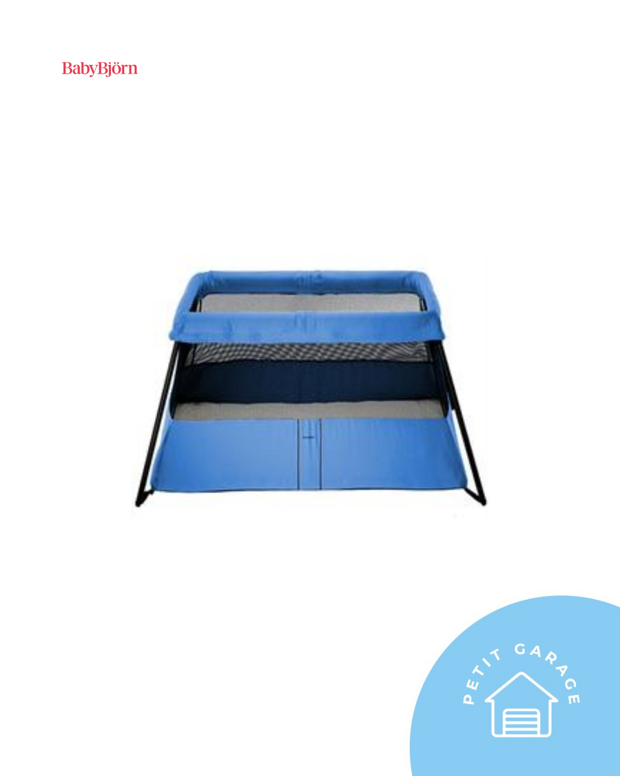 (#PG5200) Cuna Pack and Play modelo Lite Travel Crib color azul. Marca Baby Bjorn