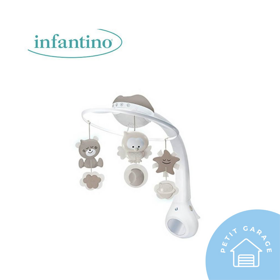 (#PG3031) Móvil proyector 3 en 1. Marca Infantino