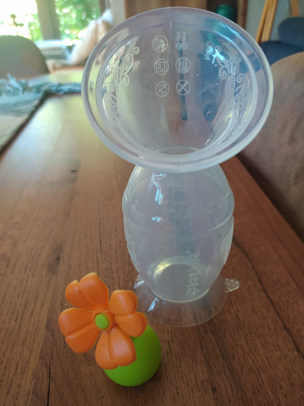 (#PG2793) Recolector de leche GEN2 150ml con tapón de flor. Marca HAAKAA