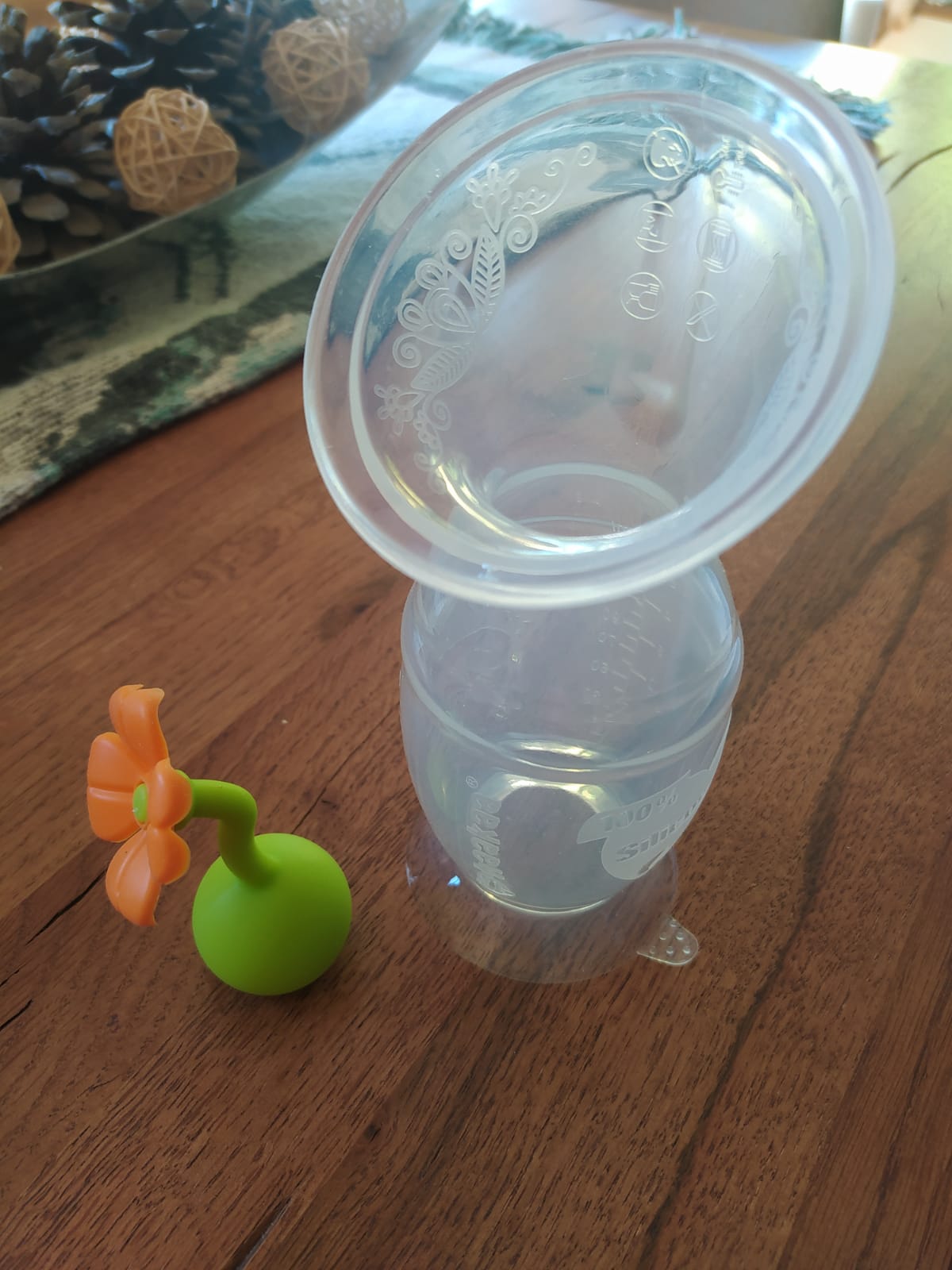 (#PG2793) Recolector de leche GEN2 150ml con tapón de flor. Marca HAAKAA