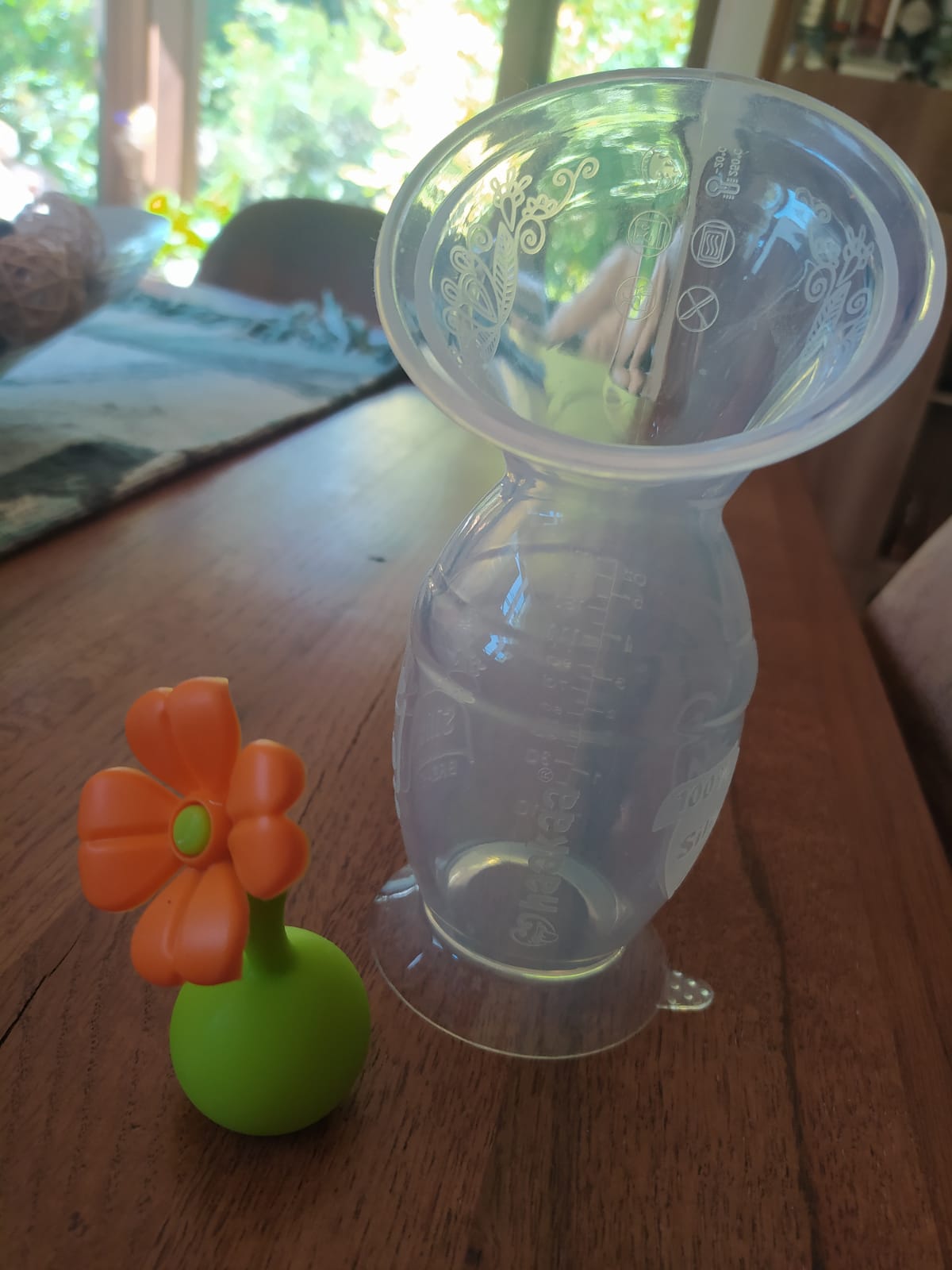 (#PG2793) Recolector de leche GEN2 150ml con tapón de flor. Marca HAAKAA