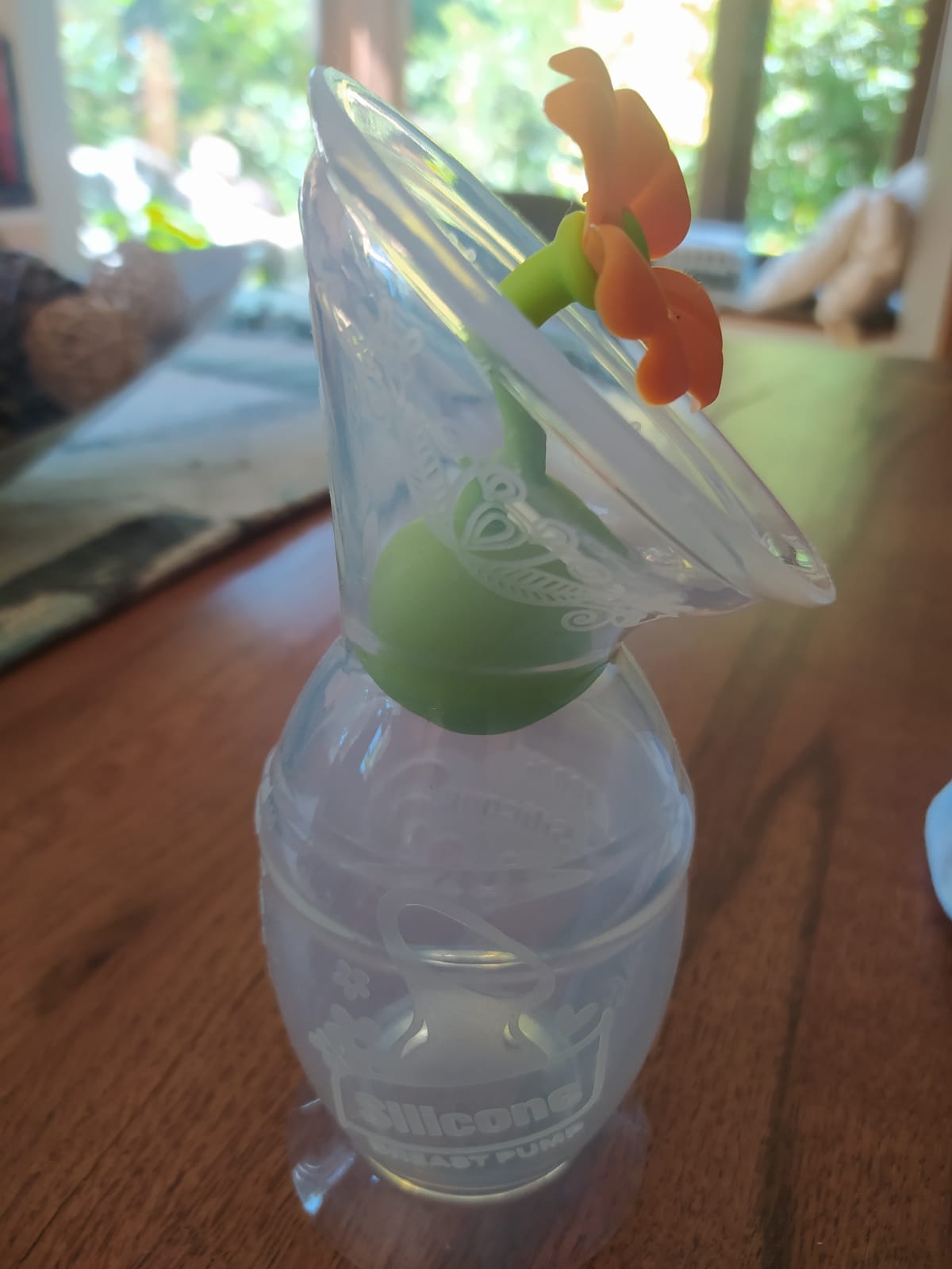 (#PG2793) Recolector de leche GEN2 150ml con tapón de flor. Marca HAAKAA