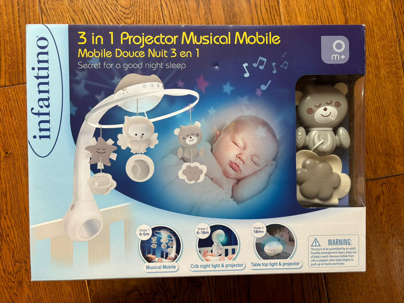 (#PG3031) Móvil proyector 3 en 1. Marca Infantino