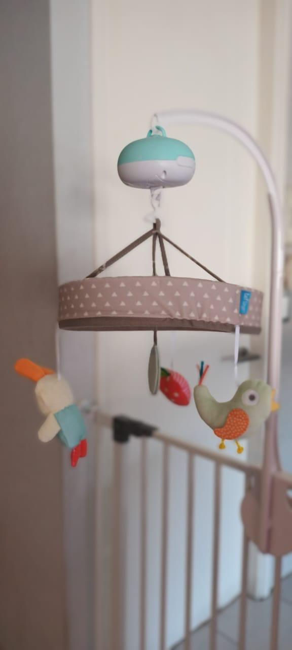 (#PG3234) Móvil musical jardín. Marca Taf Toys