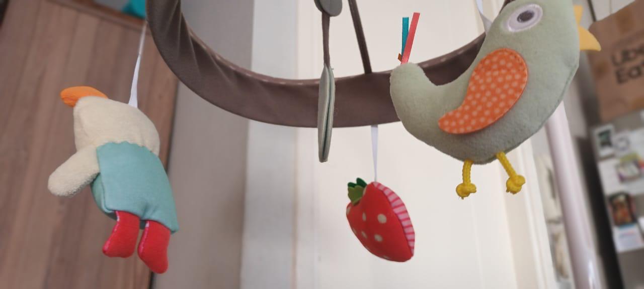 (#PG3234) Móvil musical jardín. Marca Taf Toys