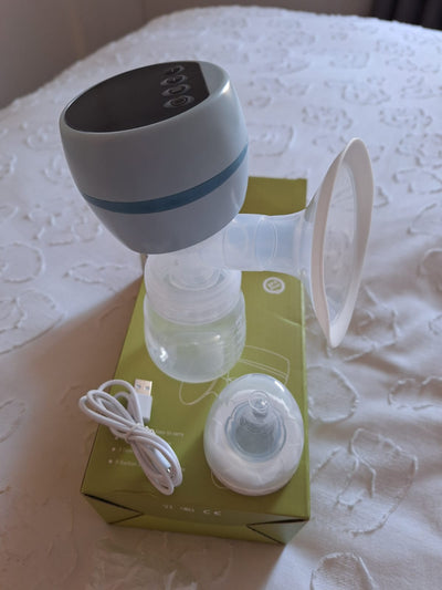 (#PG3473) Cojín de lactancia + Extractor portátil USB + Compresas calor/frío. Marca BabySpin, Lansinoh y Genérica