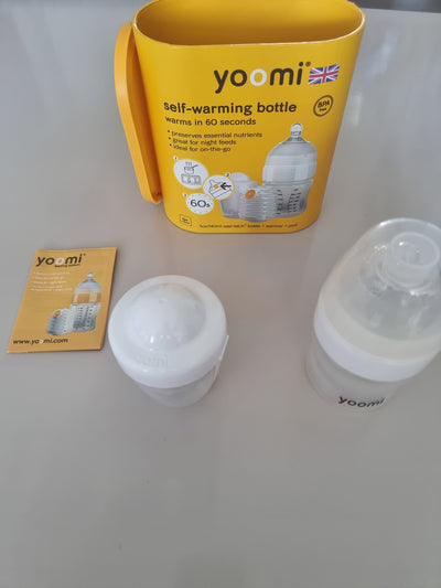 (#PG5385) Mamadera + Calentador + Cápsula. Marca Yoomi