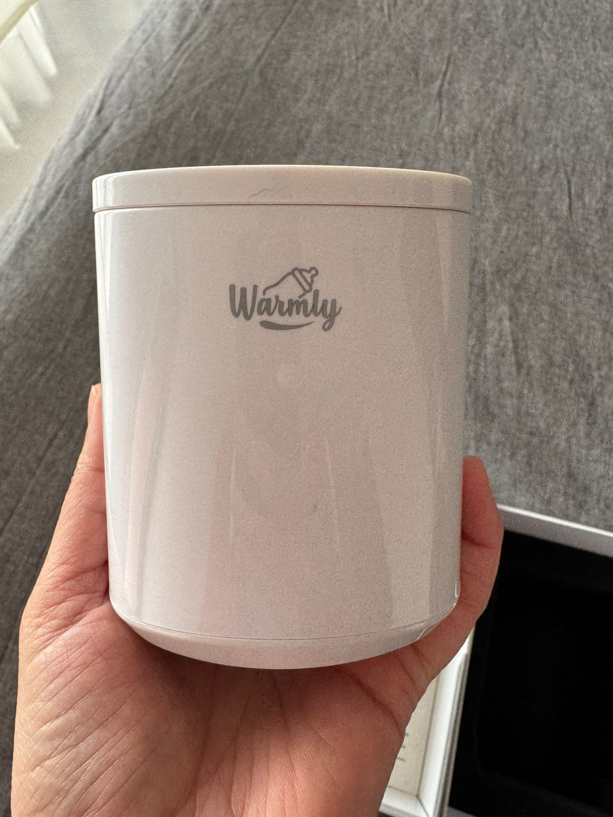 (#PG5397) Calentador de mamaderas portátil. Marca Warmly